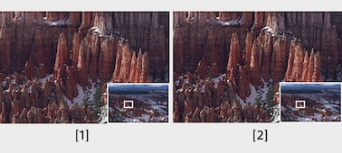 Two viewfinder images of mountainous scenery, from the Ultra-XGA OLED Tru-Finder and the Quad-VGA OLED Tru-Finder