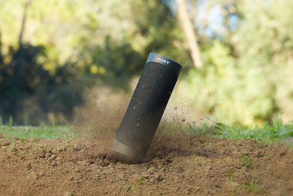 SRS-XB23 being dropped onto dusty ground.