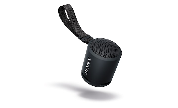 Image of the XB13 EXTRA BASS(TM) Portable Wireless Speaker with the strap attached.