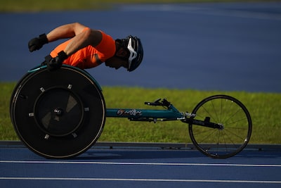 Photograph of athlete performing wheelchair athletics